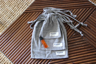 SET OF 3 STRIPED POUCHES